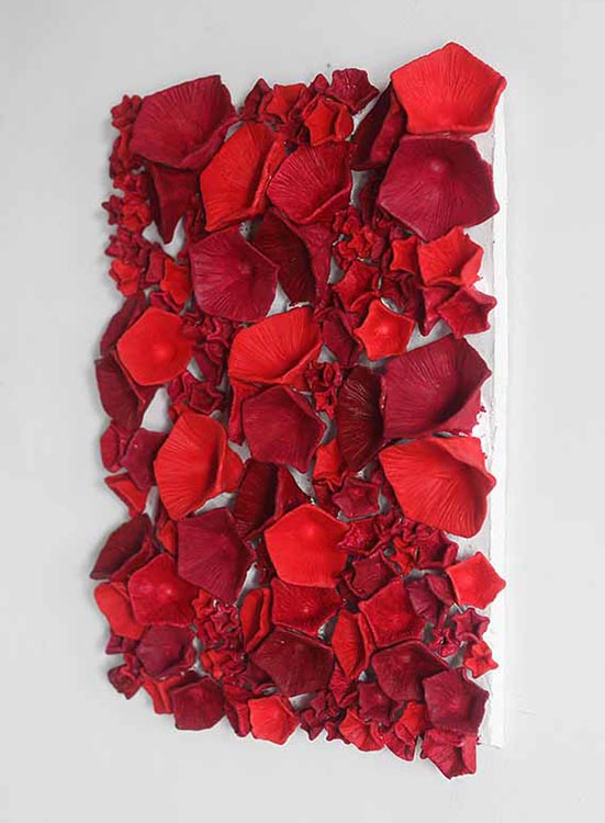 The sky-ninth noon Right view, Sculpture by Kazumasa Mizokami, Large and small red morning glory shaped objects methodically applied on the rectangular base.Right view
