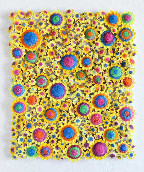 Sun light and sand 2012, Sculpture by Kazumasa Mizokami, Large and small shapes reminiscent of sunflowers are scattered on a rectangular plate: the main color is lemon and the center of the flower is colored.