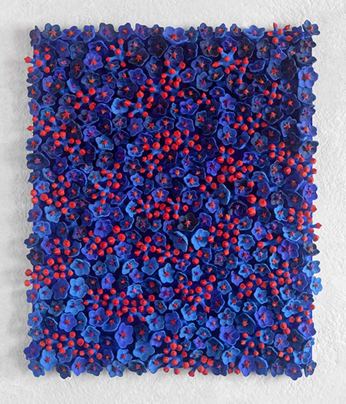 Field of milky way 2016 Sculpture of Kazumasa Mizokami,  A lot of red small sprouting buds are born from a rectangular blue soil filled with blue cherry blossoms.