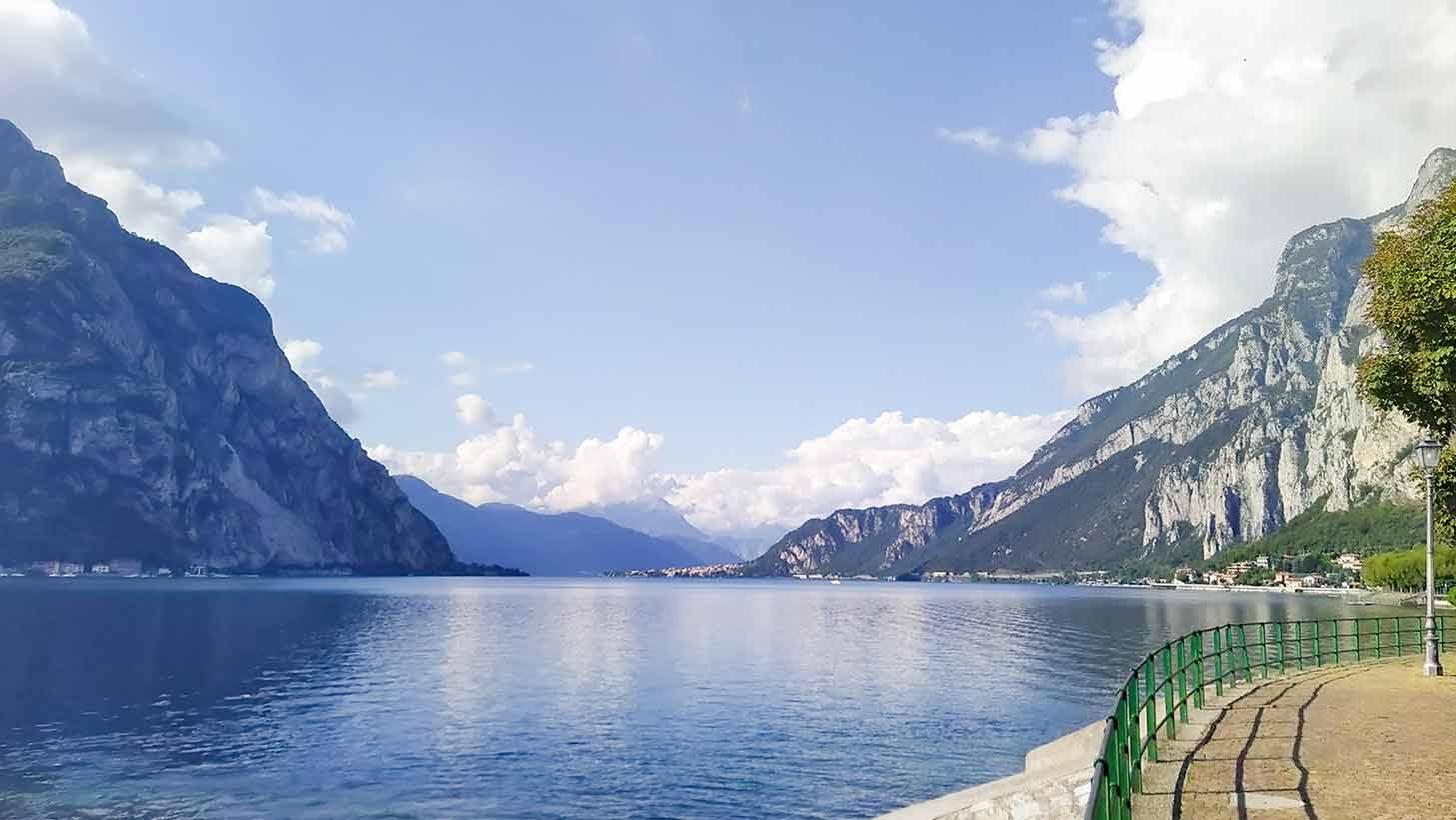 A landscape photograph of Lake Como seen from the city of Lecco taken by Kazumasa in sunny September